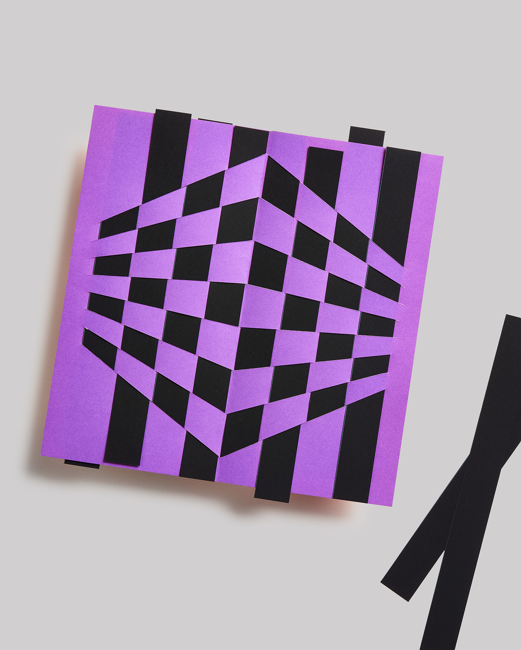 Purple and black optical-pattern craft square.